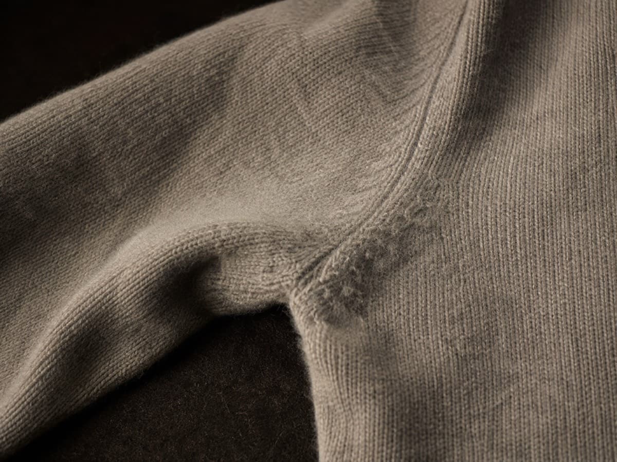 Underarm friction zone of a 30% cashmere, 70% merino sweater