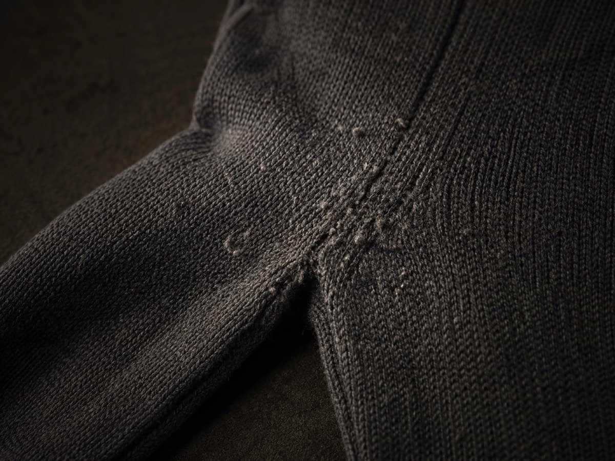 Underarm friction zone of a fine merino sweater