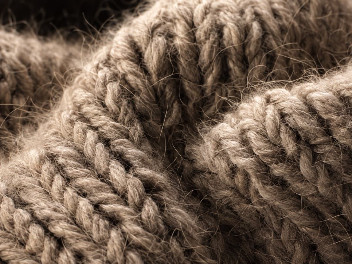 Macro of alpaca blend knitting with long guard hairs