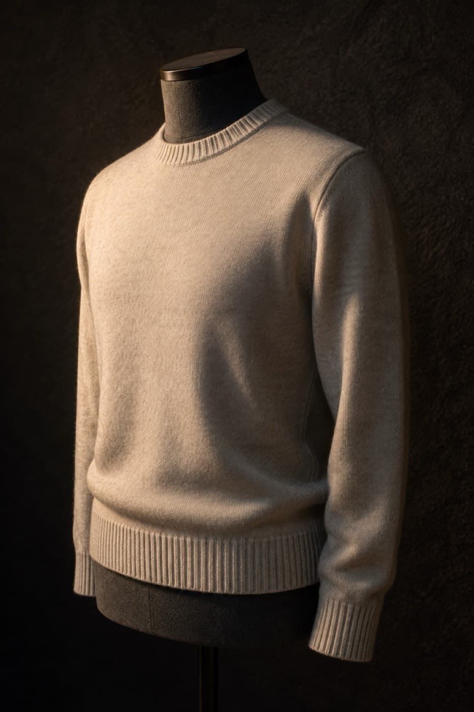 Oatmeal merino crew neck sweater on a charcoal dress form
