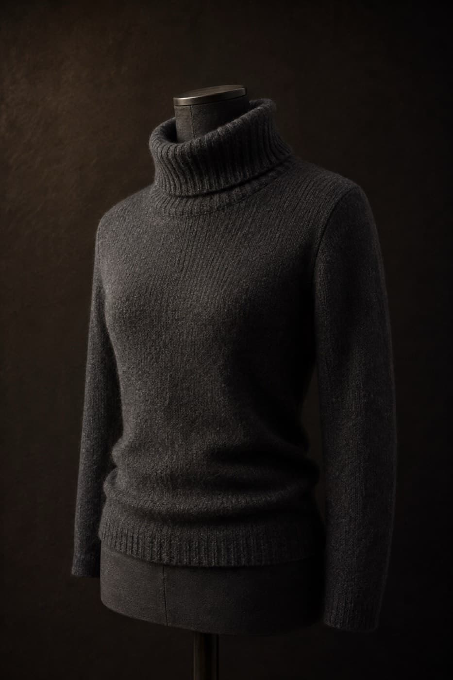 Charcoal merino turtleneck on a charcoal dress form