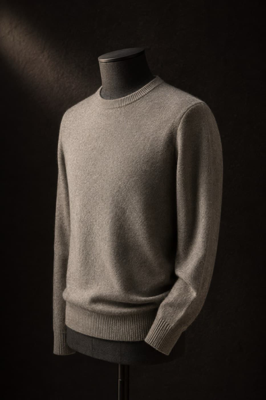 Warm stone grey 30% cashmere, 70% merino crew neck on a charcoal dress form