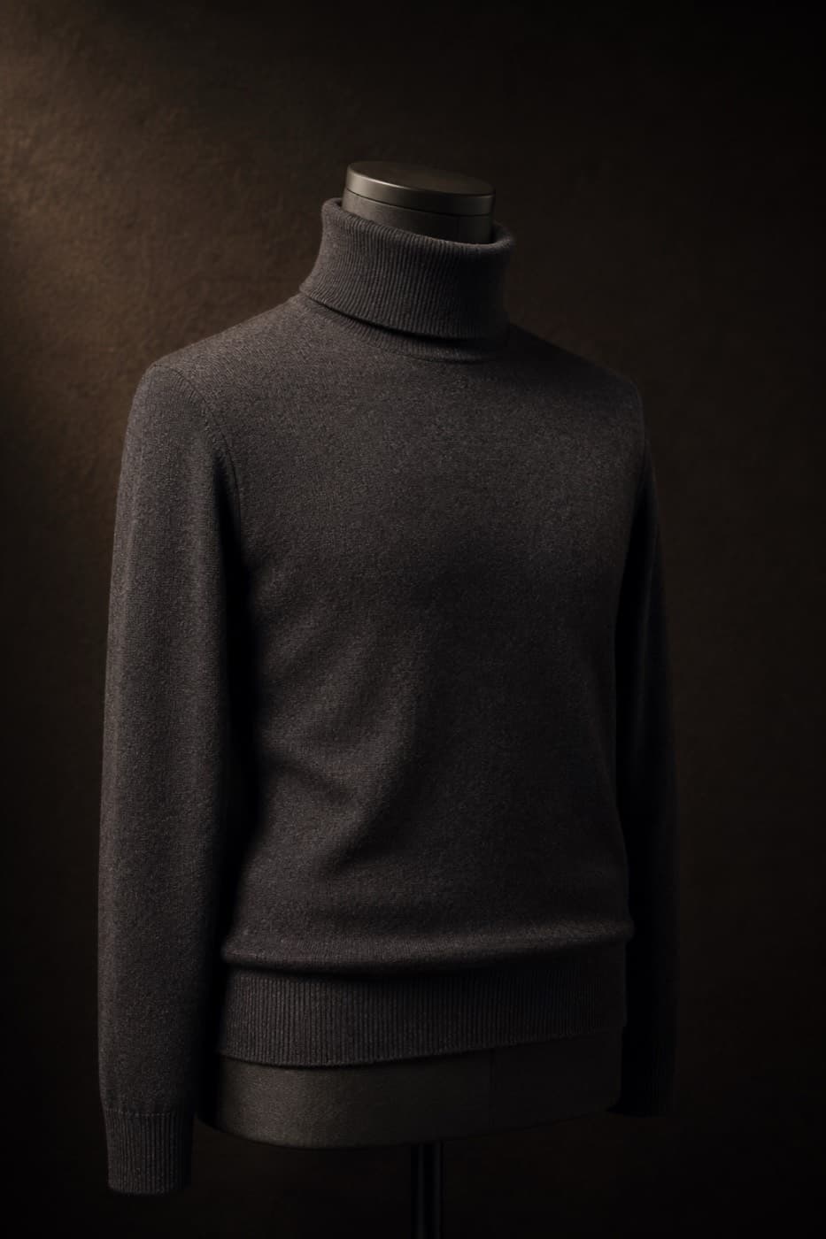 Charcoal pure cashmere turtleneck on a charcoal dress form