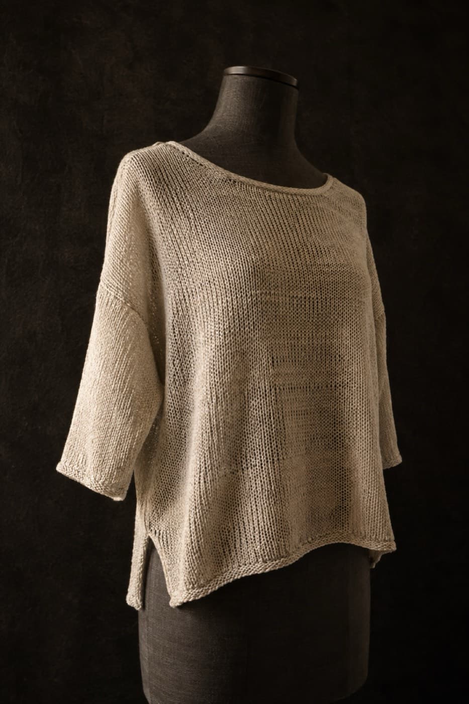 Pale sand cotton-linen summer knit on a charcoal dress form